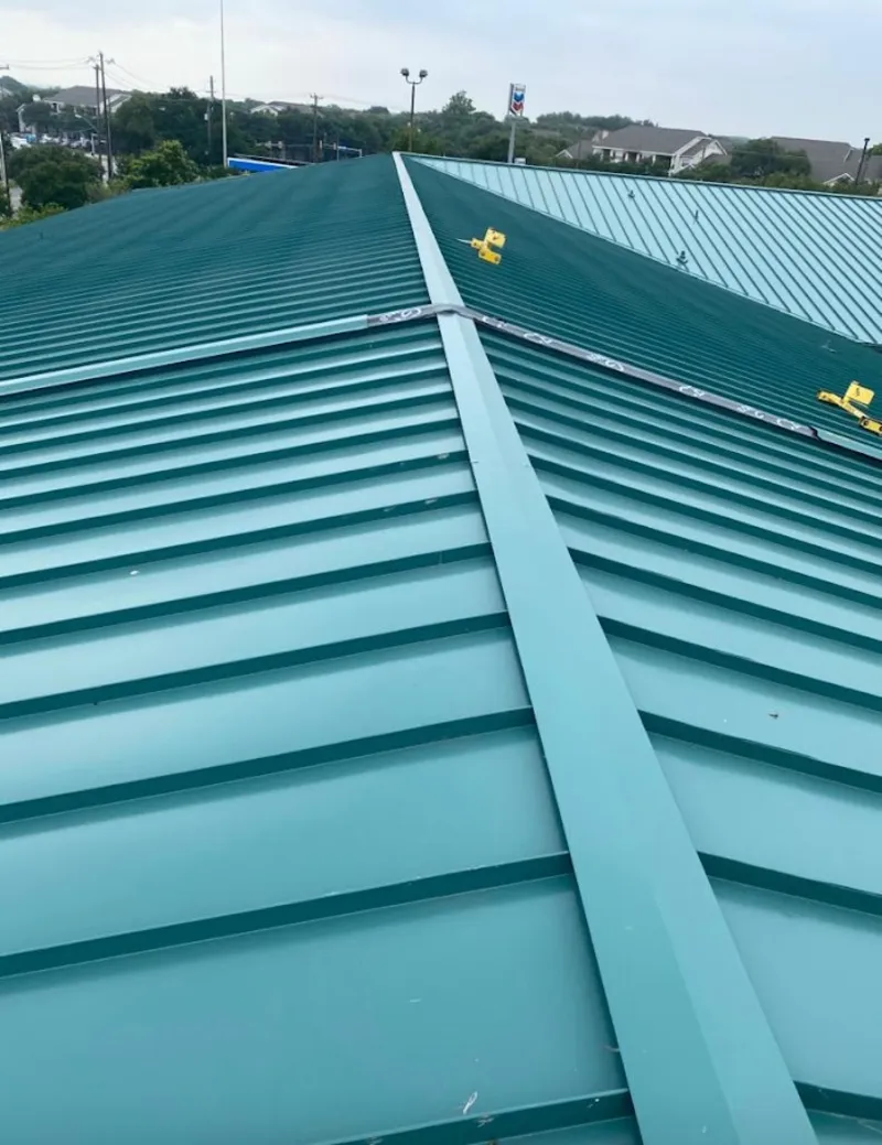 Green commercial metal roof ridge and valley for Metal Roof Repair in Sugar Hill