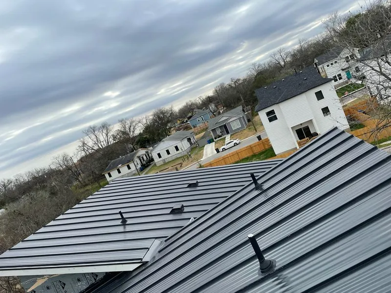 Standing seam metal roof panels with vents for Skylight Repair in Sugar Hill